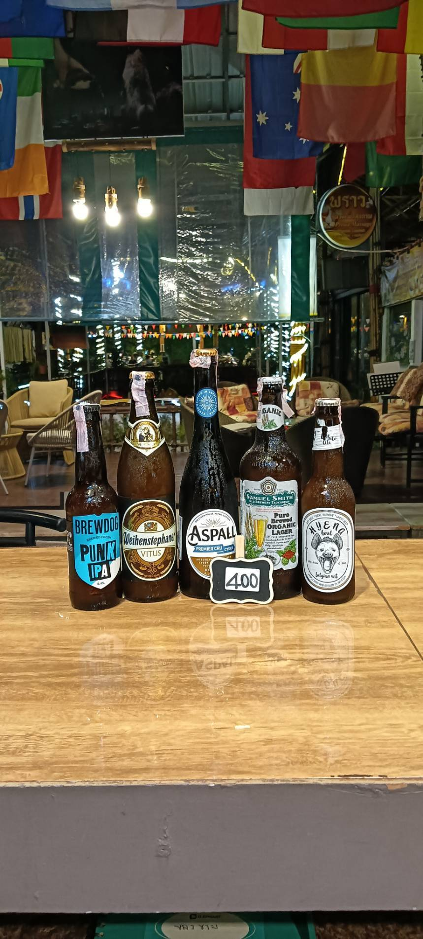 BrewDog Punk IPA, Weihenstephaner Vitus, Aspall, Samuel Smith Organic Lager and Hyena bottles, priced at 400 baht