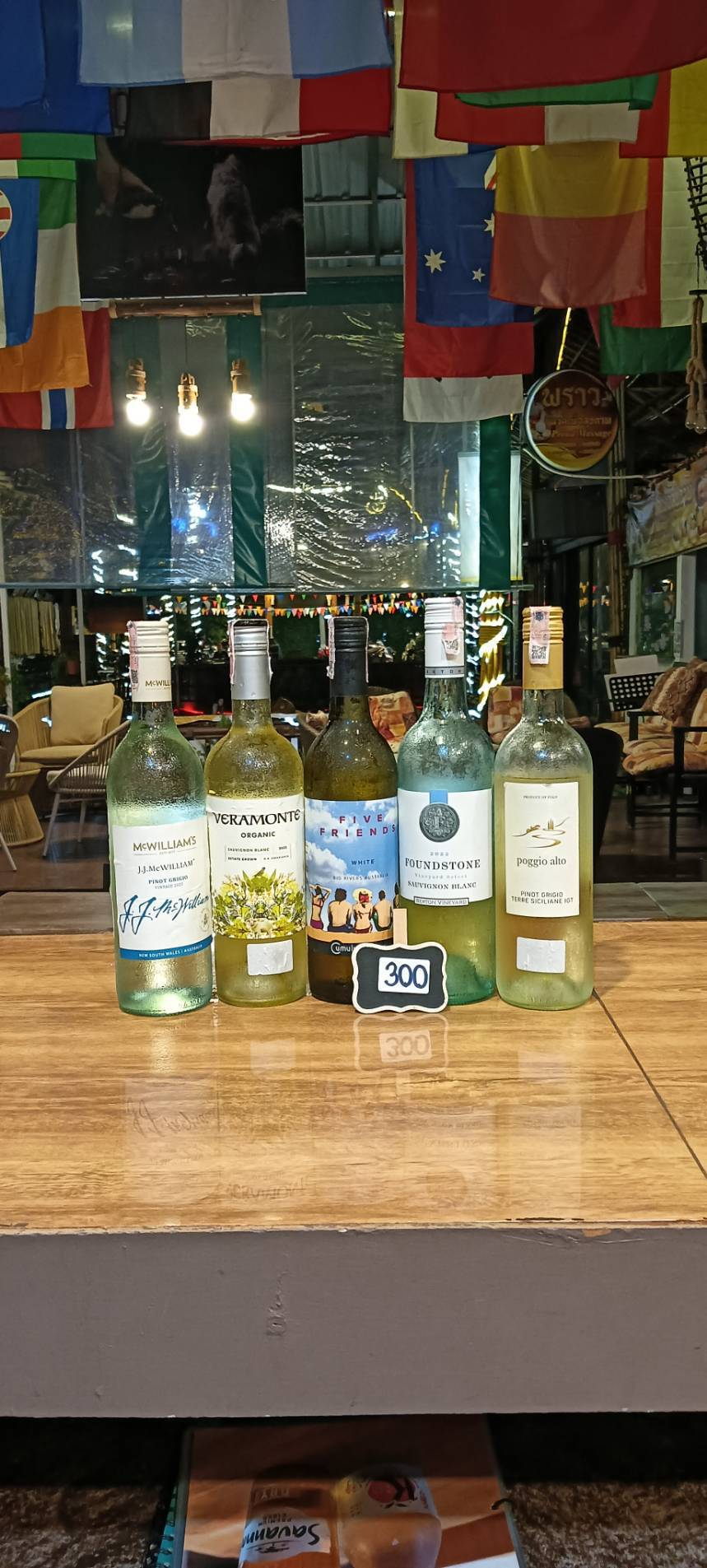 McWilliams Pinot Grigio, Veramonte Organic, Five Friends White, Foundstone Sauvignon Blanc and Poggio Alto Pinot Grigio white wine bottles, priced at 300 baht